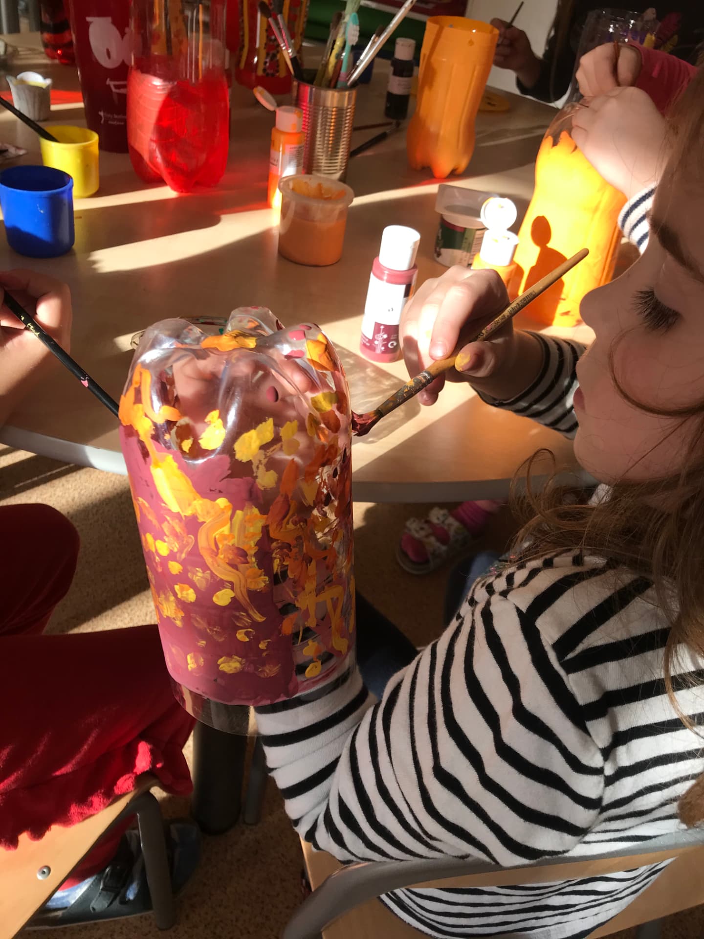 A child concentrating on an object